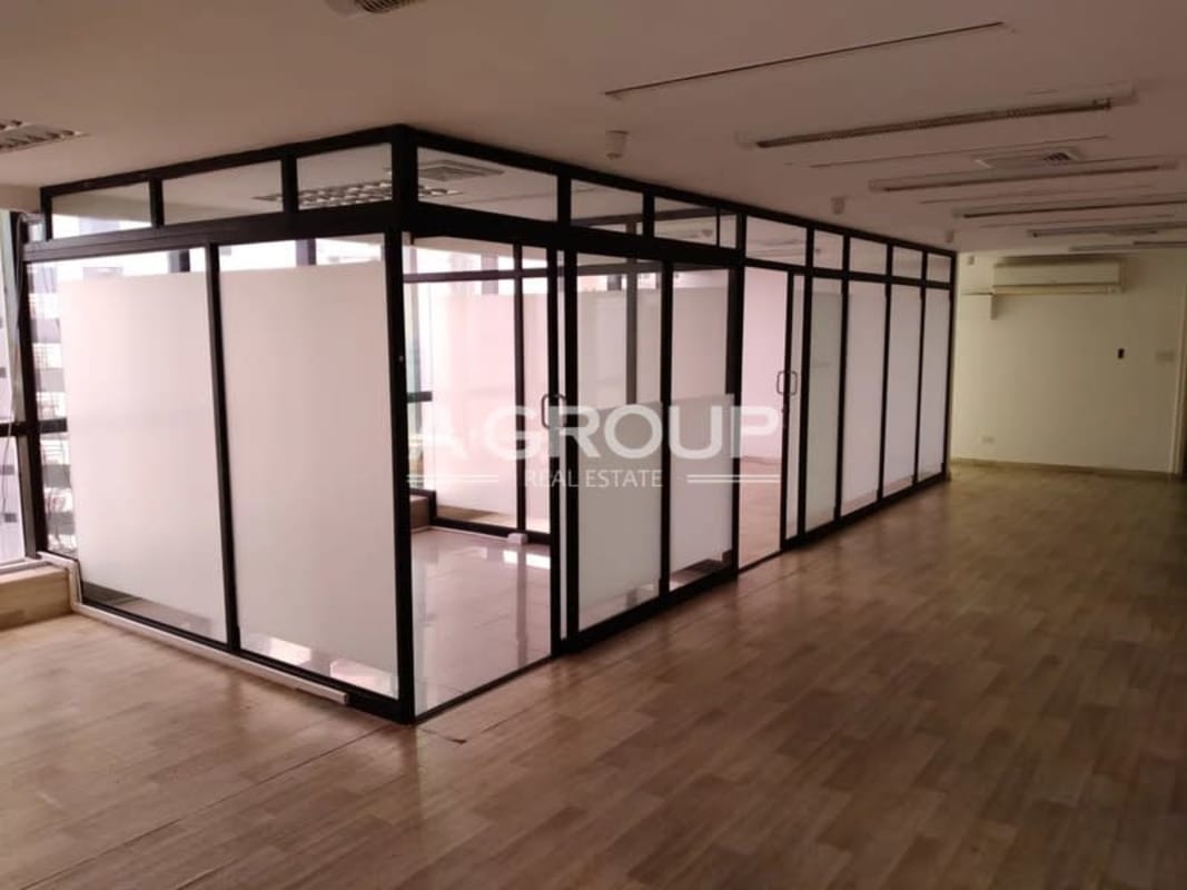 Large open-plan office space with ocean view windows in PH BAC Tower Avenida Balboa Panama