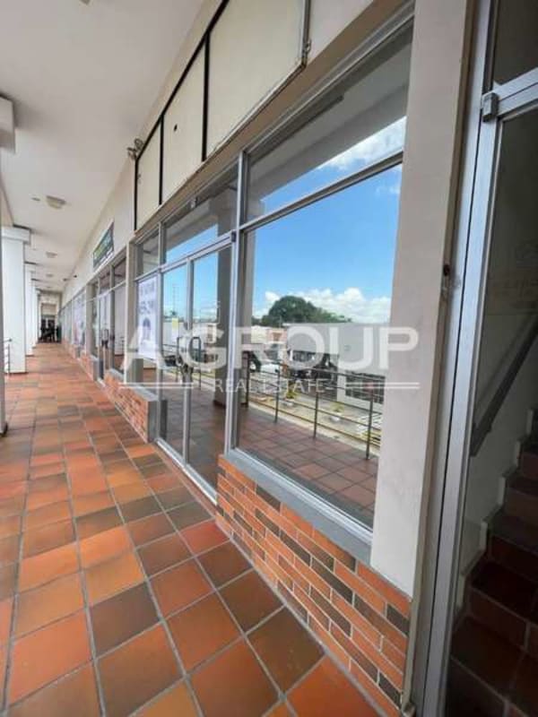 View of commercial plaza exterior with multiple stores in Brisas del Golf Panama