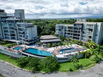 Modern beachfront condominium towers with pools and gardens Punta Caelo San Carlos Panama