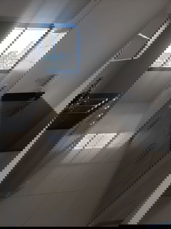 Bedroom in new apartment with bright windows overlooking Panama skyline PH El Carmen Moderno