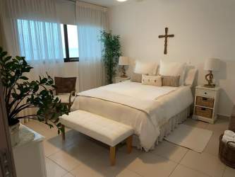 Fully equipped modern kitchen with granite countertops open to living room Ensenada Beach Club Panama