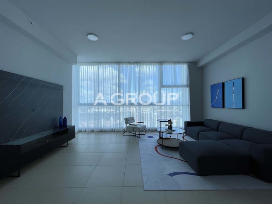 Formal dining room with ocean views, marble flooring, terrace entrance in PH Country Club Costa del Este Panama