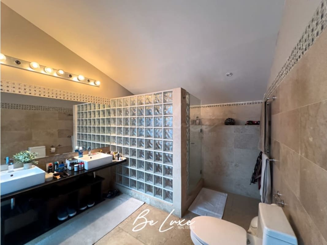 Modern bathroom with vessel sink, glass block shower, tile finishes PH Casa Monte Fiore Casco Viejo