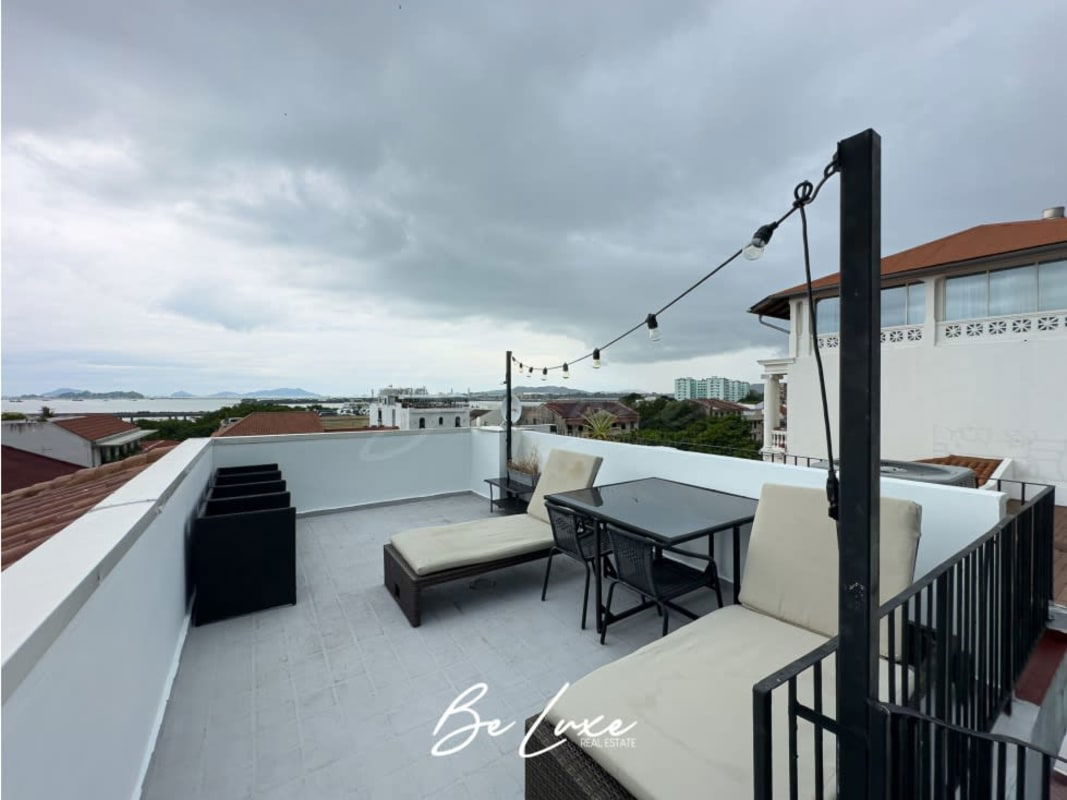Modern minimalist rooftop terrace with panoramic city ocean Casco Viejo Panama