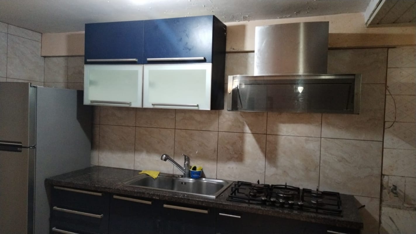 Covered terrace and balcony overlooking patio garden in residential house Betania Panama