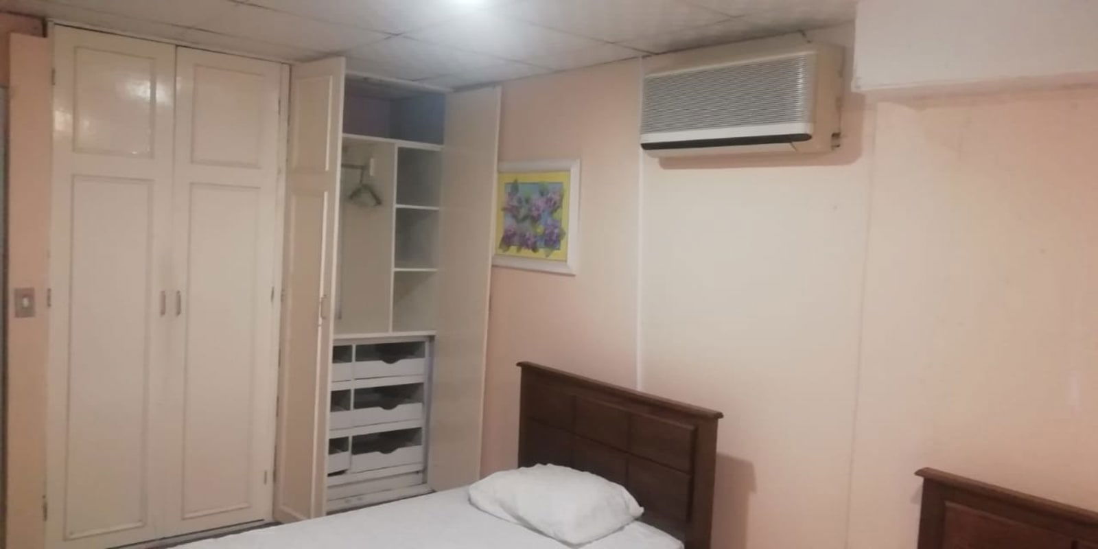 Laundry area with washer and dryer space ceramic tiled walls in La Locería Betania Panama City