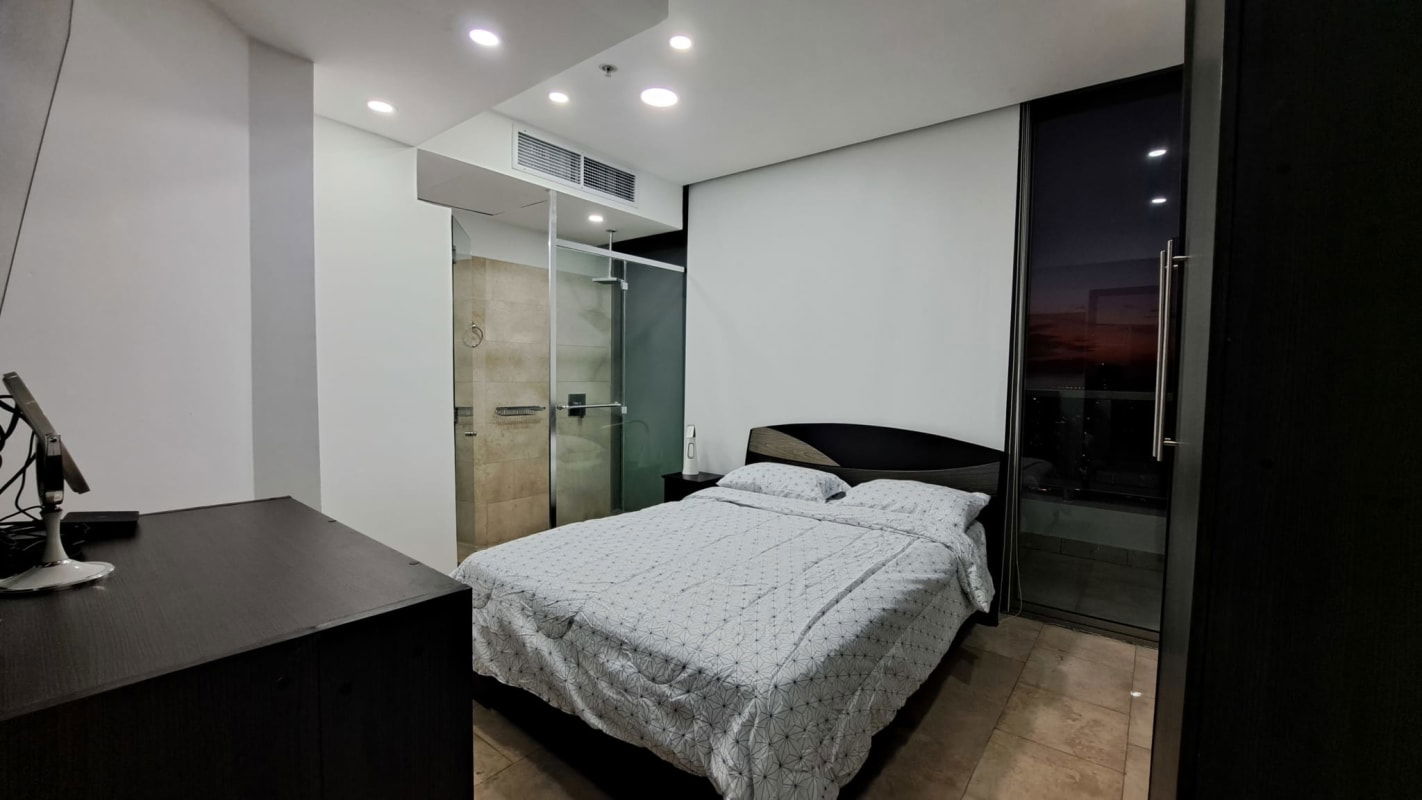 Spacious living room with panoramic city vistas in luxury condo Panama City