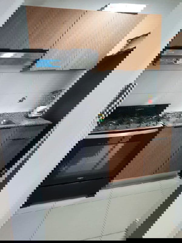 Bedroom with panoramic windows and city views at PH Downtown Obarrio Panama City.