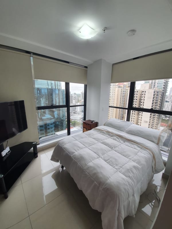 Modern bathroom featuring patterned accent tiles and walk-in shower PH Downtown Obarrio Panama City.
