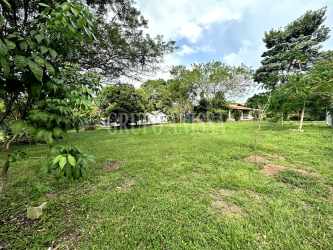 Large flat lot with green grass and blue sky near Valle de Antón Panama