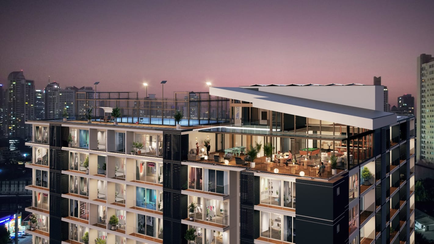 PH HUB building exterior showing rooftop terrace and sports court at night in Panama City