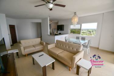 Spacious living dining room with large windows ocean views Torre Patricia Italia Farallón