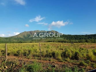 Large flat land plot with mountain backdrop near Pacific beaches Chame Panama