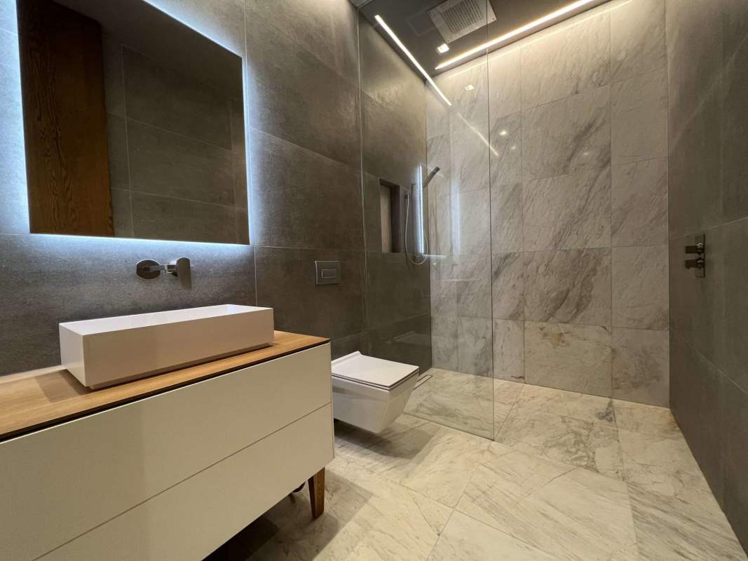 Cozy bedroom with floor-to-ceiling windows showing Punta Pacífica skyline Ocean Reef Islands villa Panama