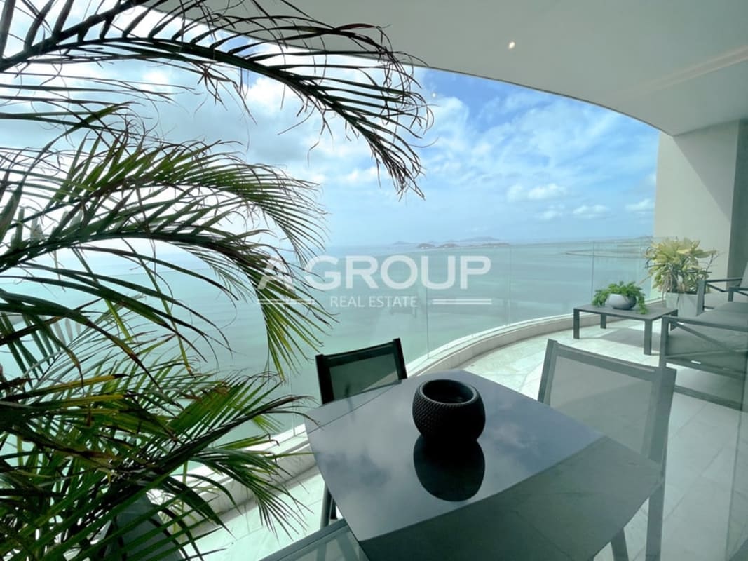 Curved balcony with glass railing panoramic view Pacific Ocean Panama City in The Towers Paitilla