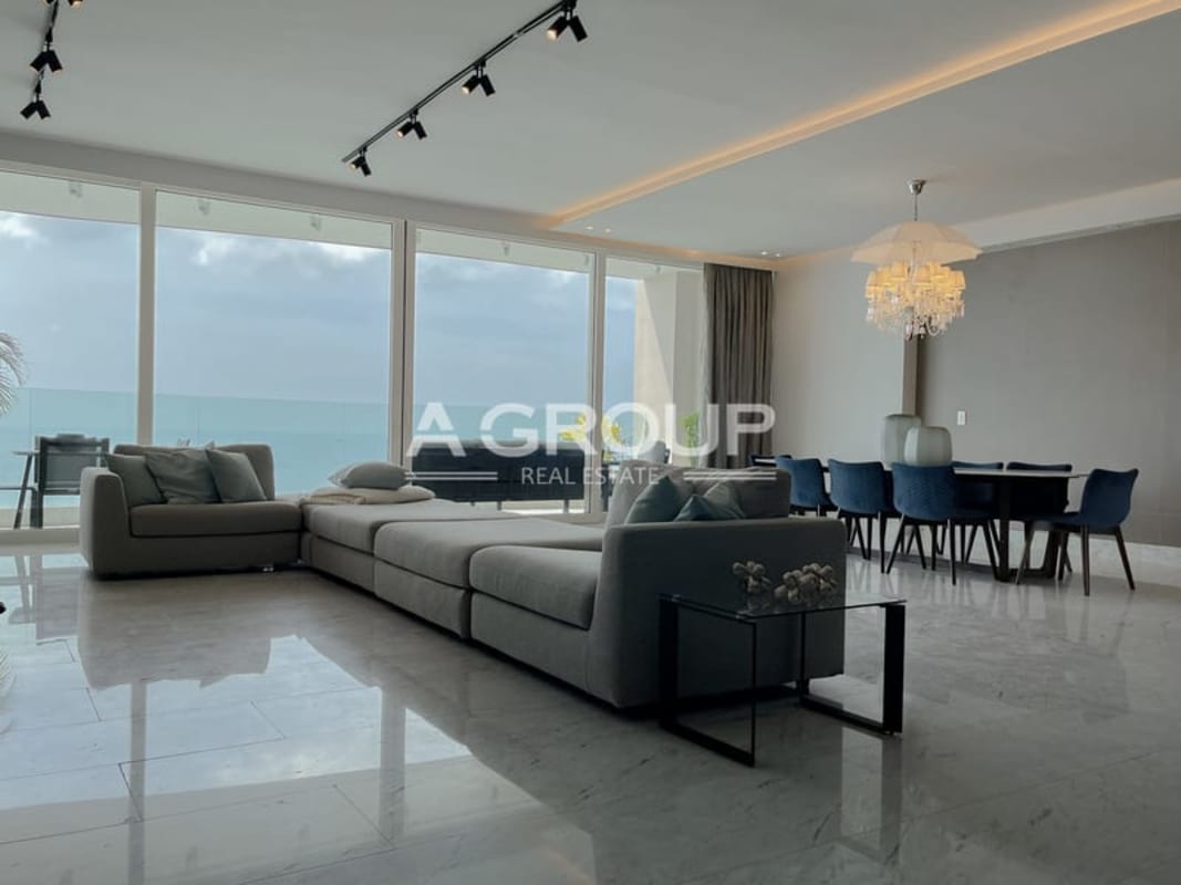 Indoor gym with boxing ring, cardio and weight equipment at The Towers Punta Paitilla Panama