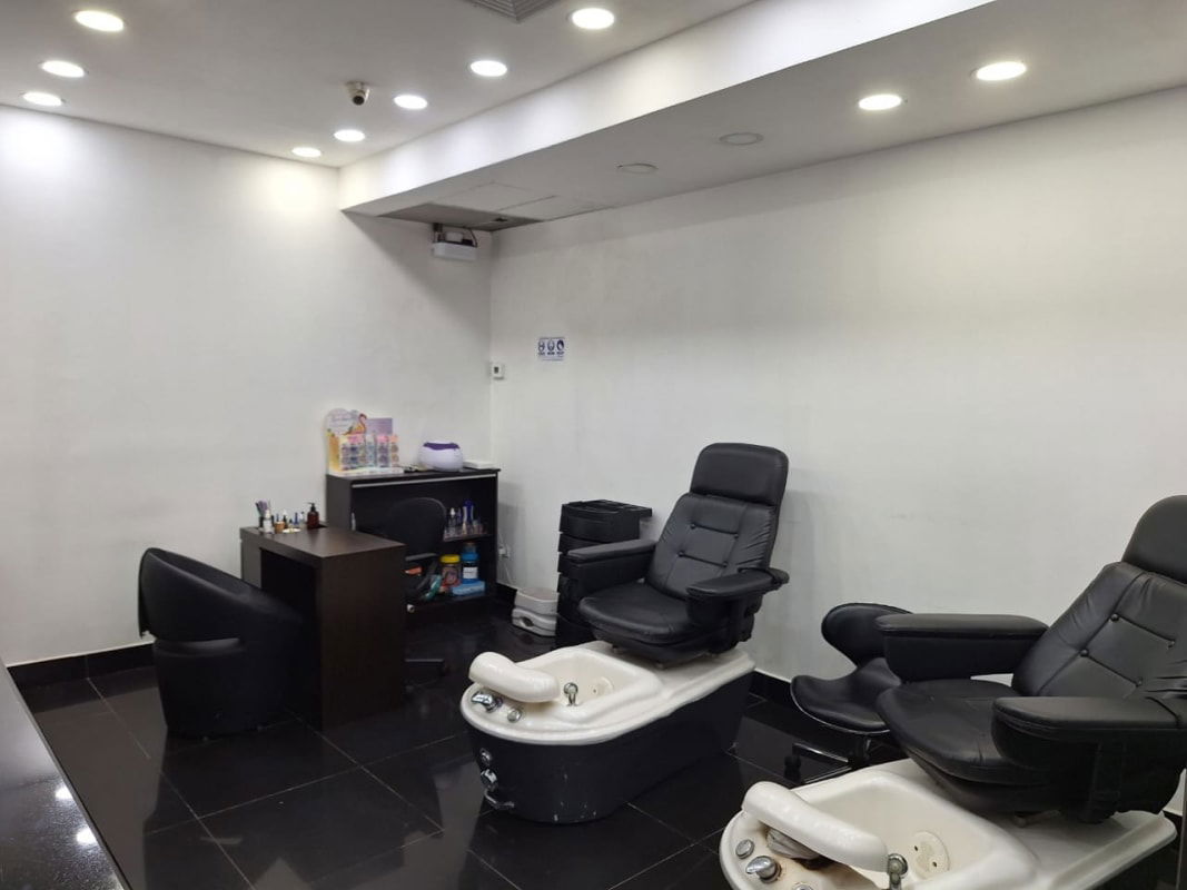 Pedicure chairs manicure station bright nail salon Costa del Este business for sale