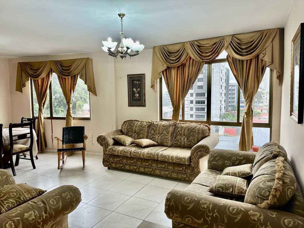 Functional kitchen with tile backsplash, gas stove, and cabinets Golden Gate Tower Panama