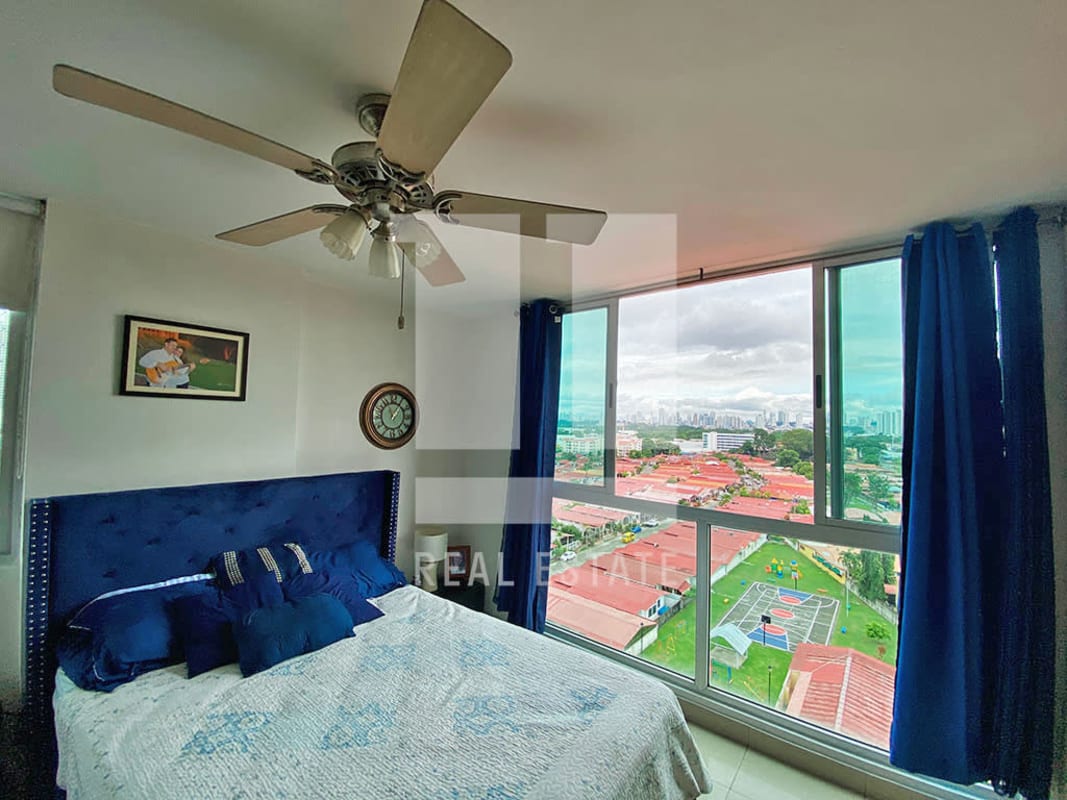 Spacious master bedroom with window and city view at PH La Creta in Chanis Panama City