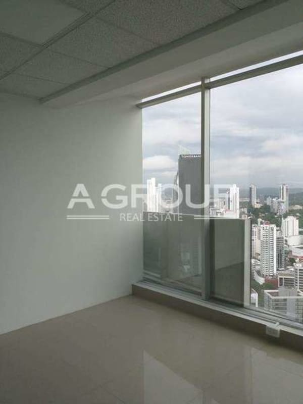 Modern glass-partitioned office cubicles inside PH F&F Tower Calle 50 Panama