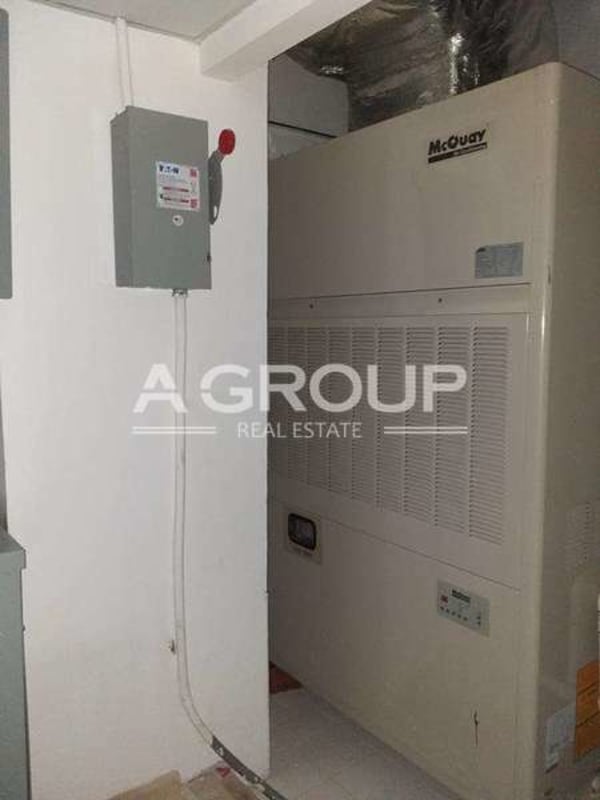 Utility room with large HVAC installation in office tower in Panama City