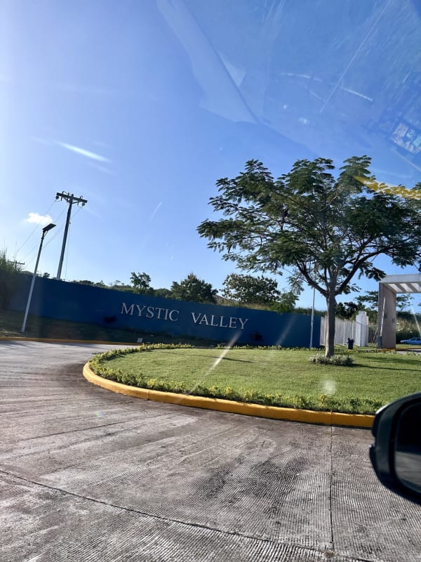 Living room with sliding glass door to balcony, porcelain tile floor at PH Mystic Valley El Crisol Panama