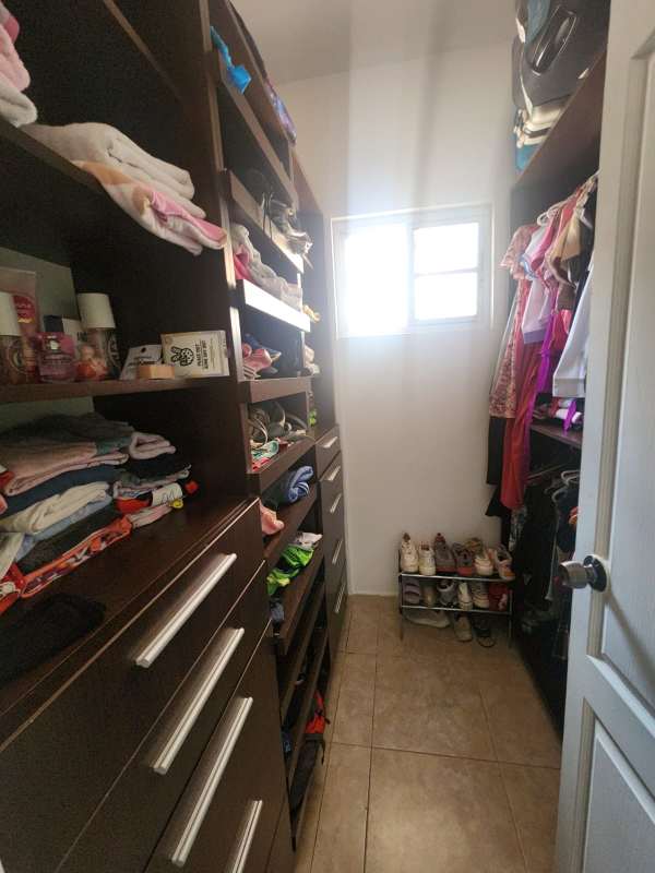 Covered outdoor living terrace private backyard Palmeras del Este Costa del Este Panama