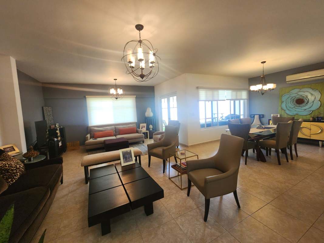 Luxury walk-in closet with custom wood cabinetry Palmeras del Este Costa del Este Panama