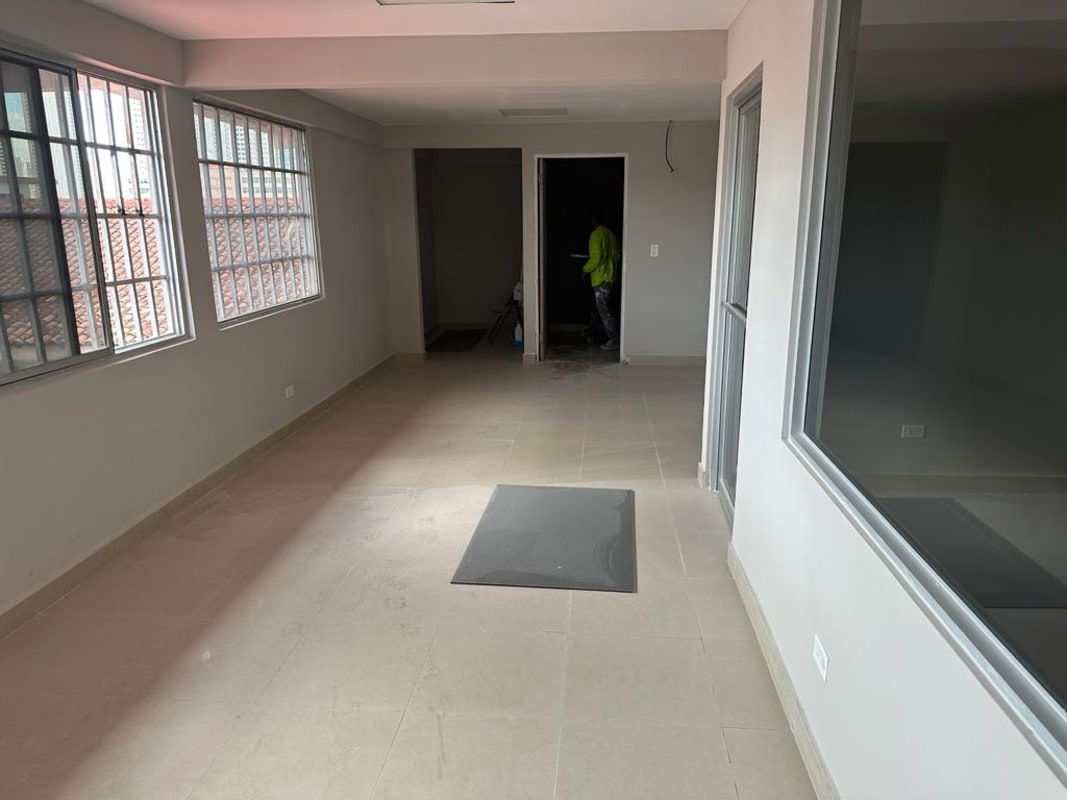 Empty corridor with glass partitions in commercial building Perejil Bella Vista Panama City