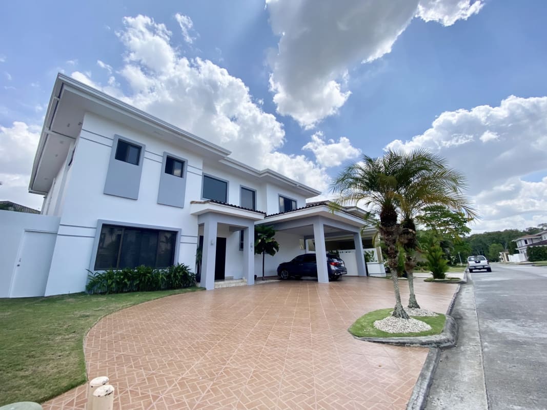 Spacious kitchen with granite counters, stainless appliances, lighting in Costa del Este luxury house Panama
