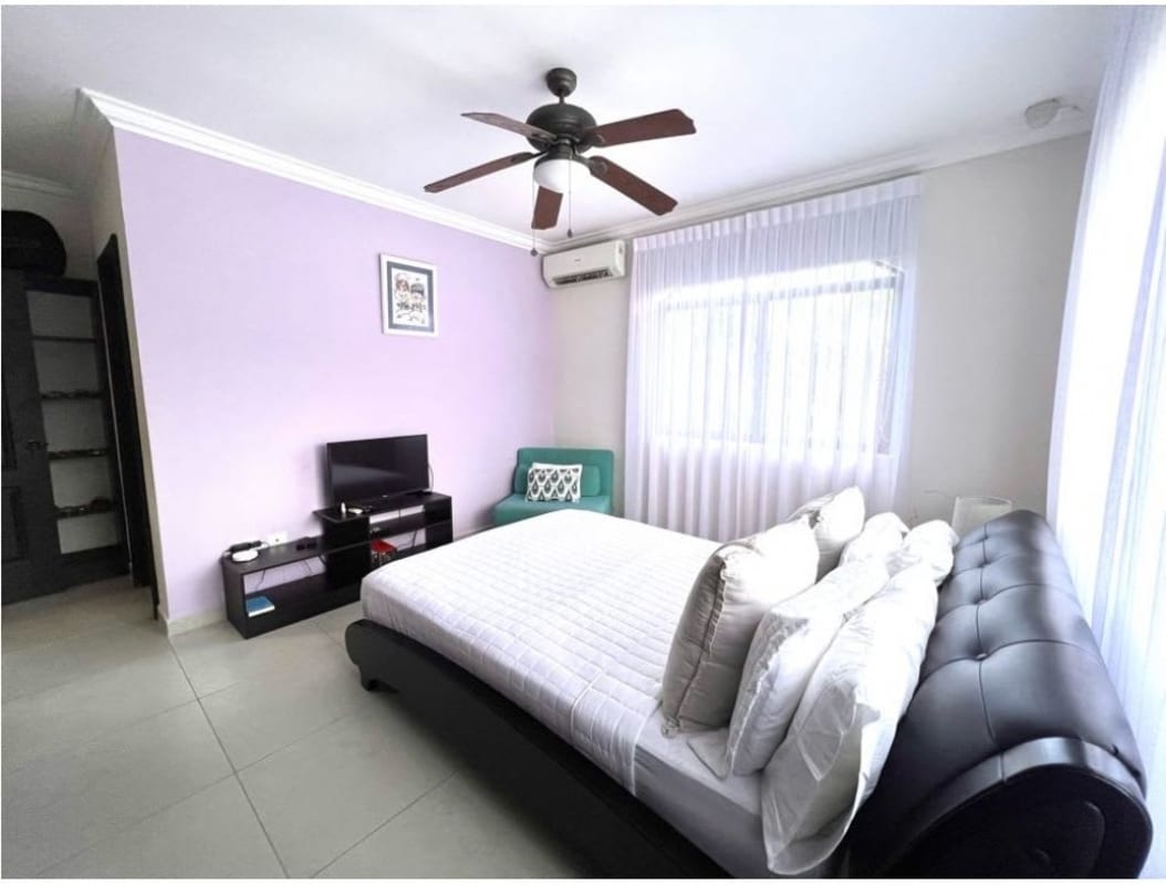 Large open living area with garden views tile floors luxury house clayton village panama