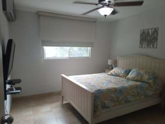 Large terrace with stunning ocean views, seating area, Playa Blanca condo for rent