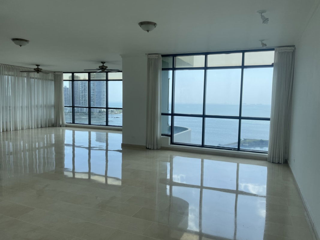 Marble tiled modern bathroom with glass shower and vanity PH Miramar Panama