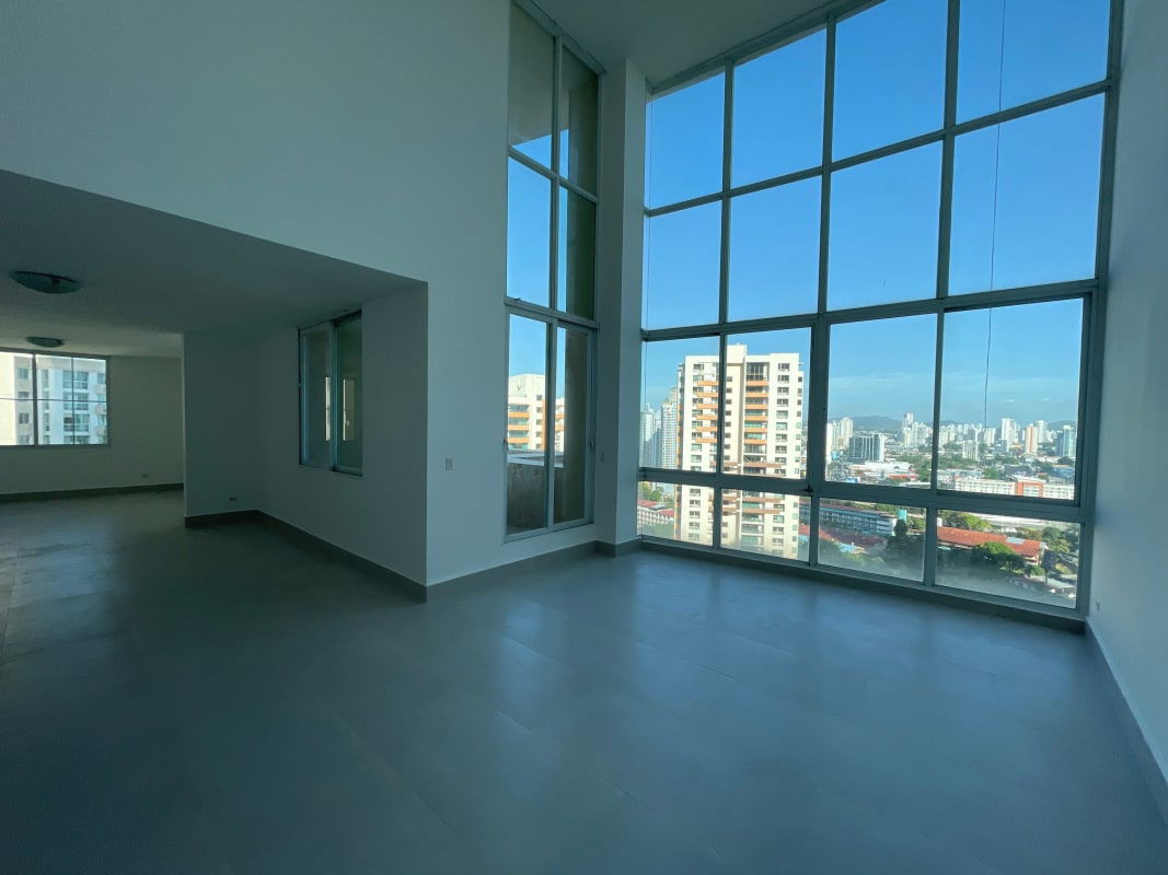 Bedroom with large window split AC beige tile floors PH Costa Pacifica Punta Pacifica