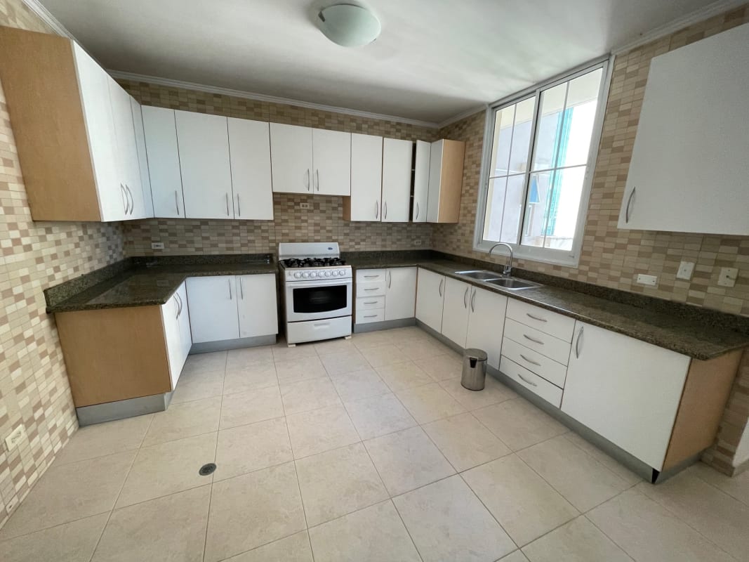 Kitchen with granite countertops mosaic backsplash window PH Costa Pacifica Panama City