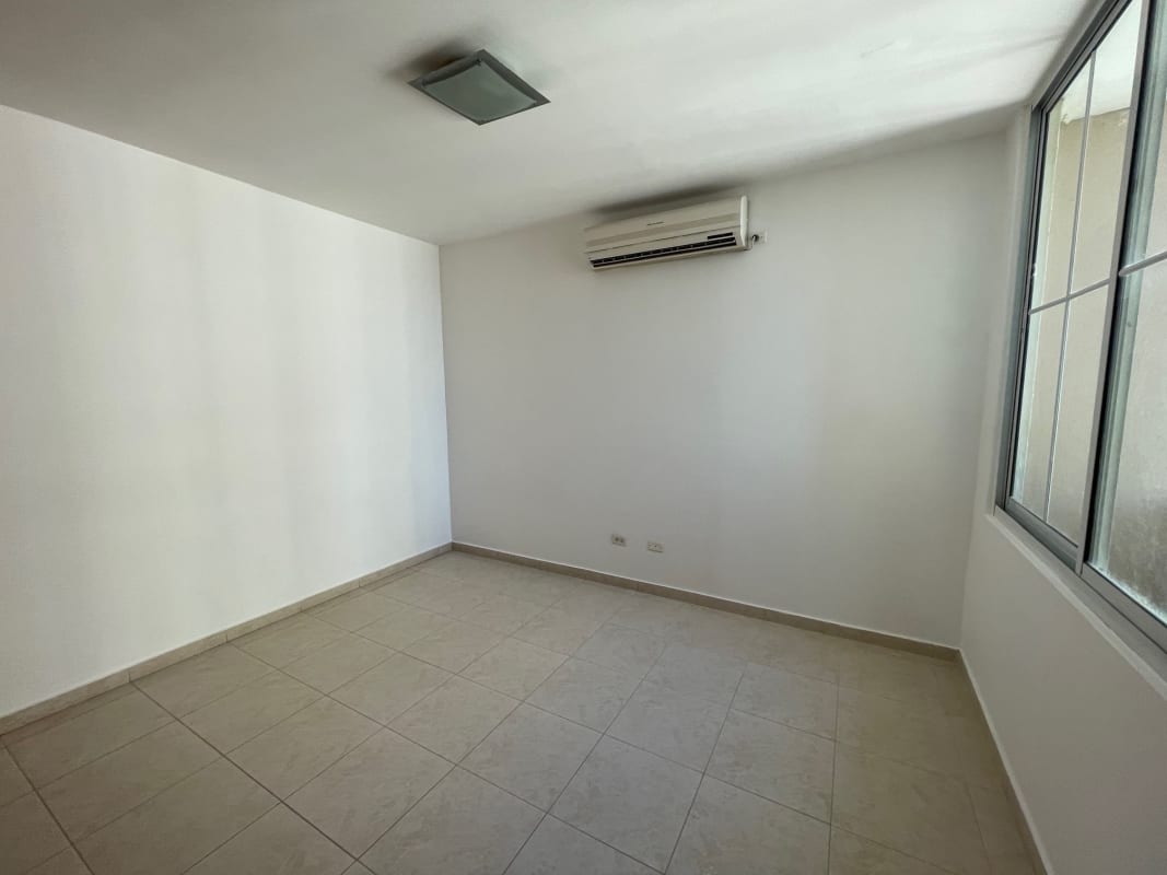 Bedroom with AC window city view beige tile PH Costa Pacifica Punta Pacifica