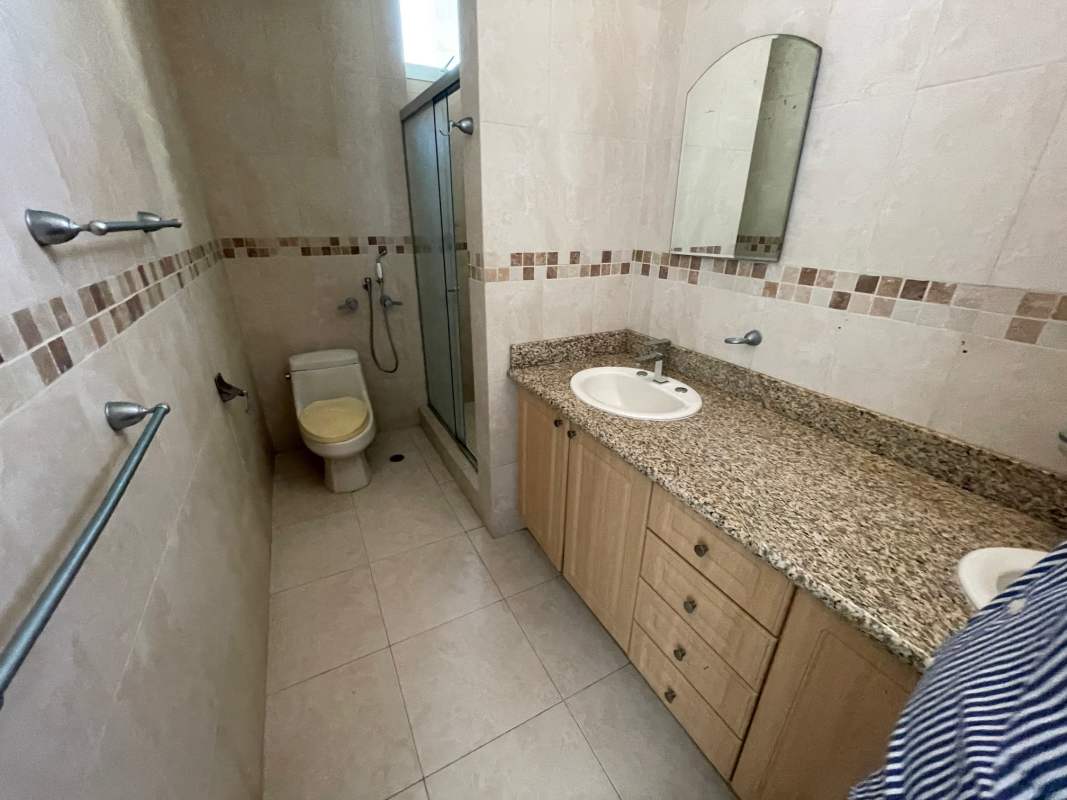 Modern bathroom beige tiles granite sink glass shower PH Costa Pacifica Panama