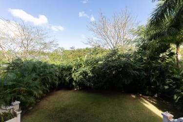 Balcony view of tropical gardens and golf PH Puntarena Buenaventura Panama