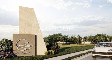 Modern gated entrance to Buenamar beach community at Buenaventura Panama
