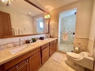 Gourmet kitchen with granite countertops wood cabinetry luxury Buenaventura condo