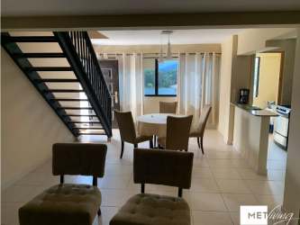 Laundry facilities with washing machines and dryers inside Brisas de Coronado Panama townhouse