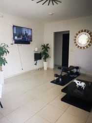Modern bathroom with granite countertop sink and tile finishes in rental house San Pablo Viejo David Panama