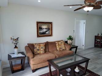 Fully equipped modern kitchen with granite countertop, stainless appliances PH Coronado Bay Playa Coronado