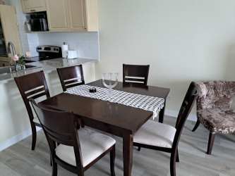 Second bedroom with ocean view, split AC and ceiling fan at PH Coronado Bay Panama