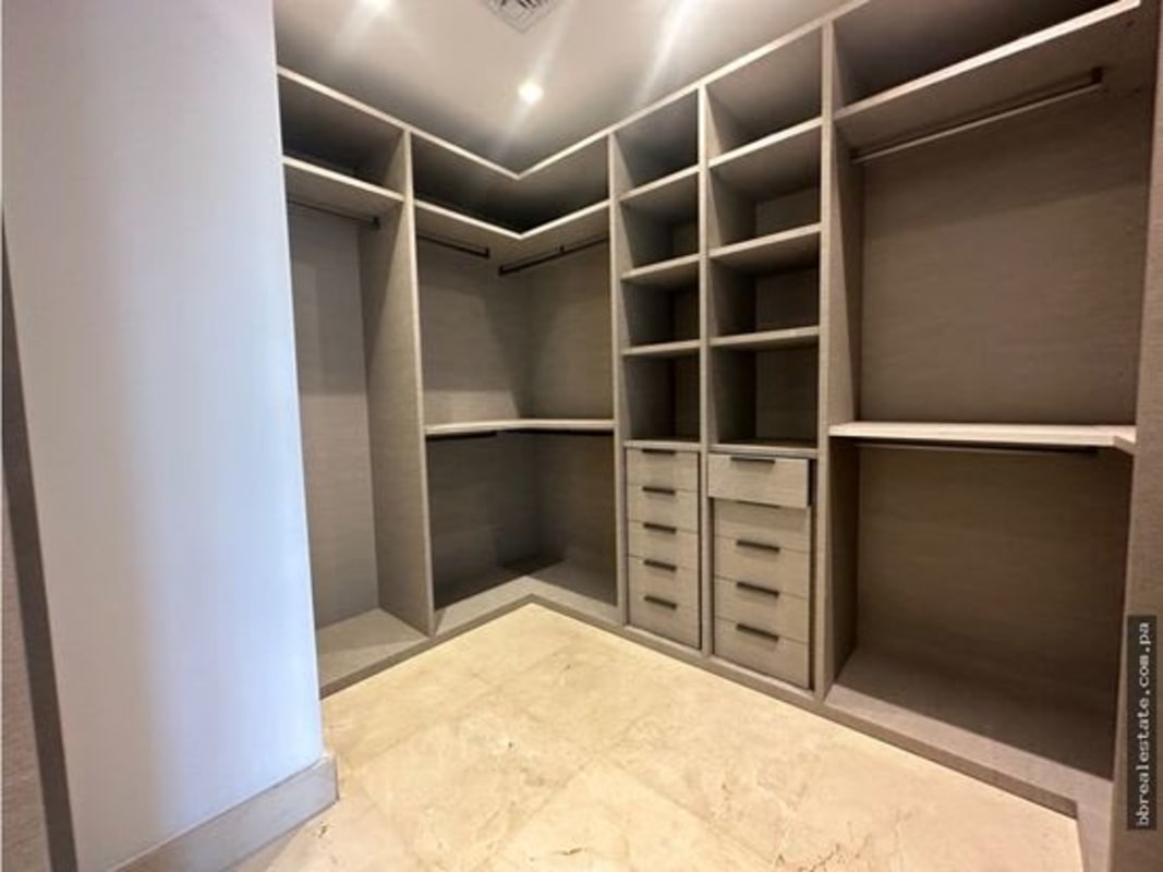 Contemporary lounge with large glass windows at PH Garden Apartments Ocean Reef