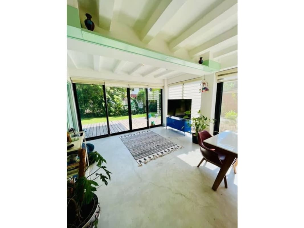 Spacious master bedroom with balcony access and large windows Albrook house Panama