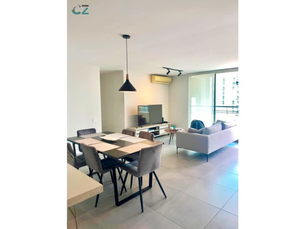 Bright living and dining room with balcony access in PH Pacific Wind Punta Pacifica