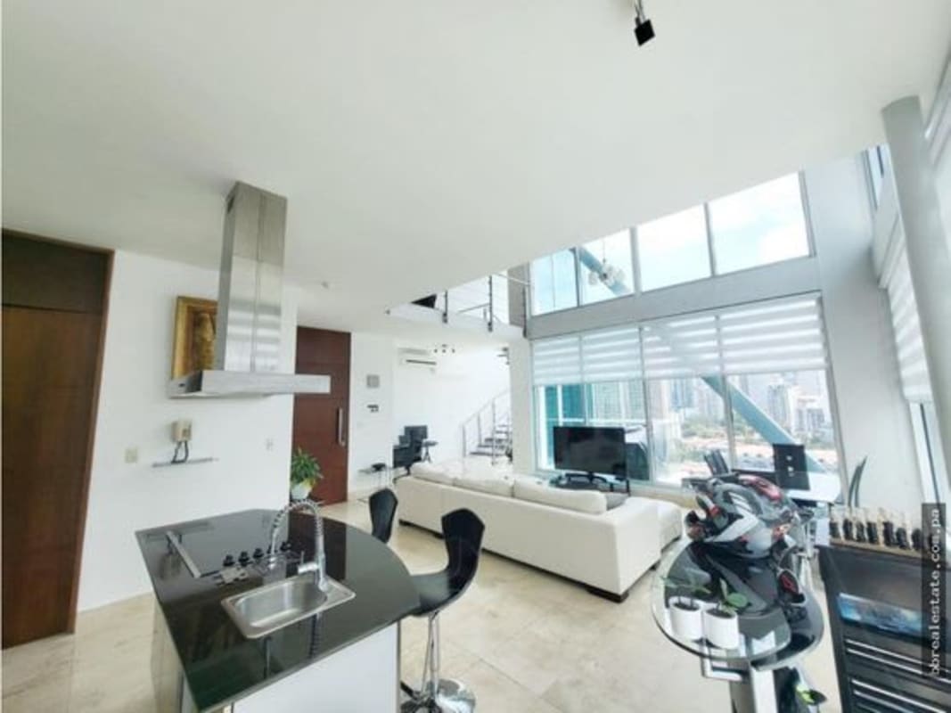 Private balcony overlooking Panama City skyline and partial ocean in PH Loft Four 41