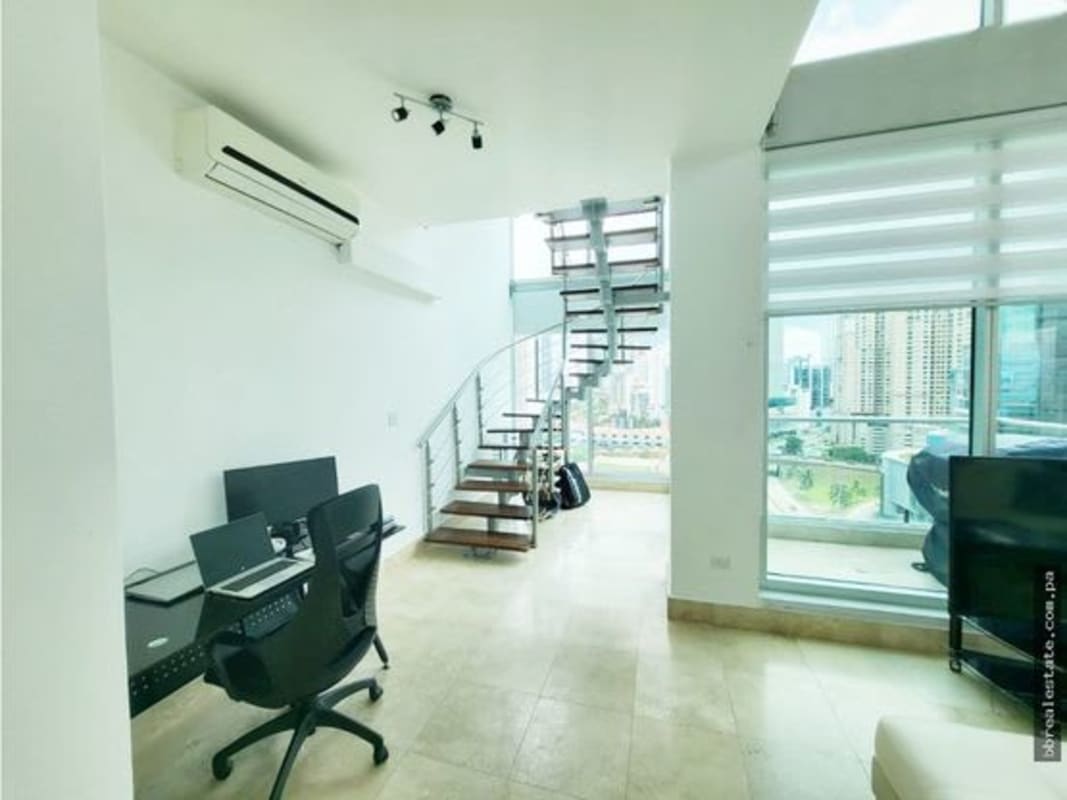 Open-style modern kitchen with breakfast bar in PH Loft Four 41 Panama