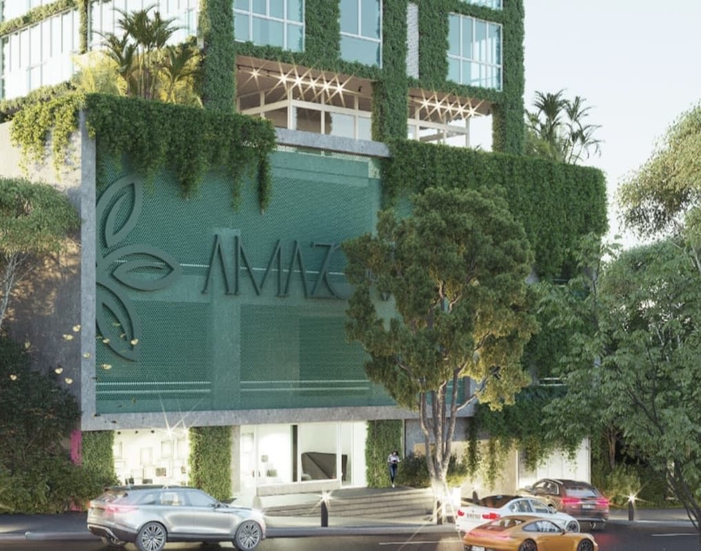 Facade with living green wall vertical garden at eco-friendly condominium Bella Vista Panama